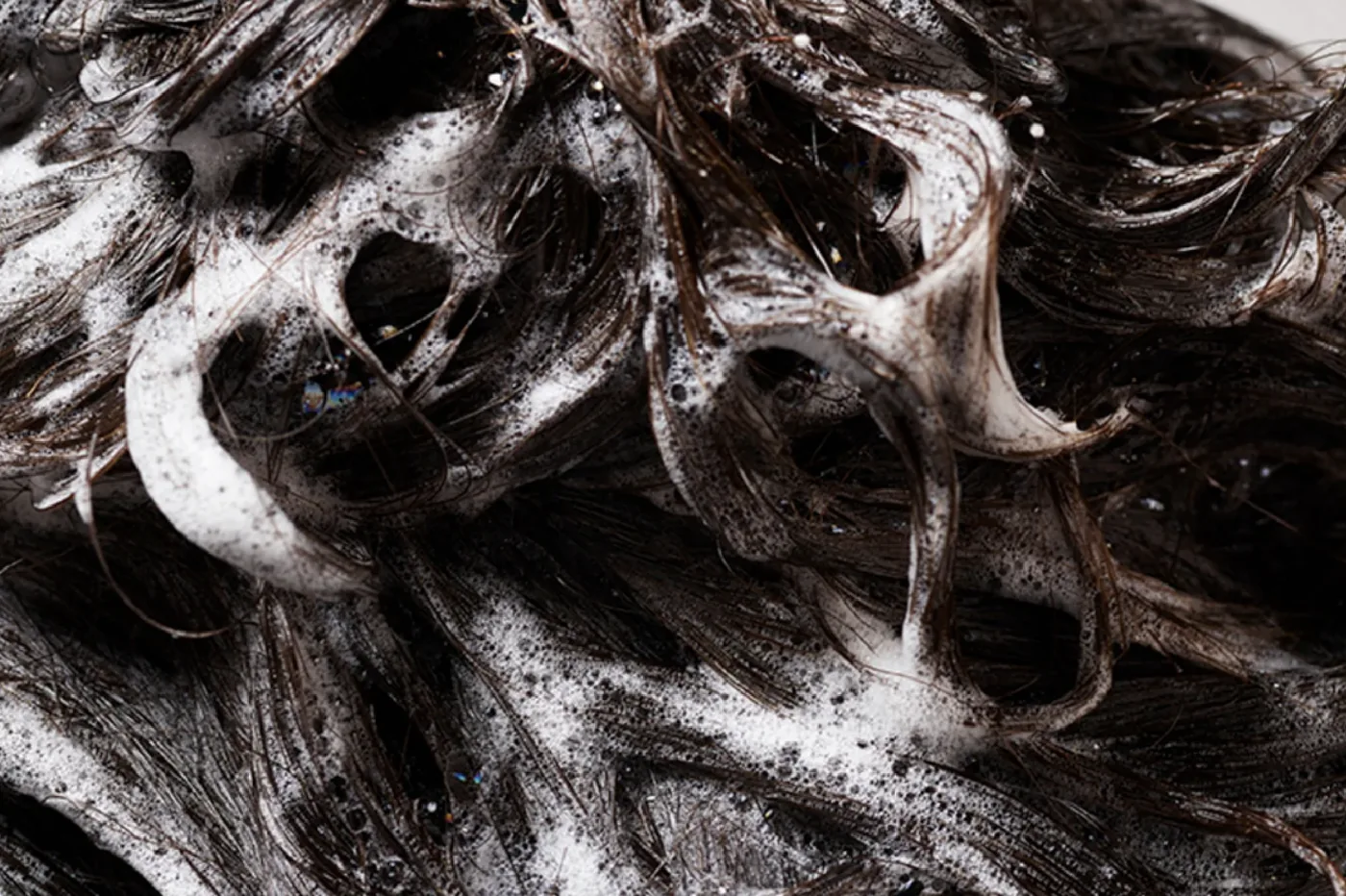 Rich lather worked through hair during a scalp cleanse at Park and Eve Hair Studio